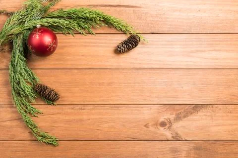 Christmas background made with pine branches, pine cones and Christmas decora Stock Photos