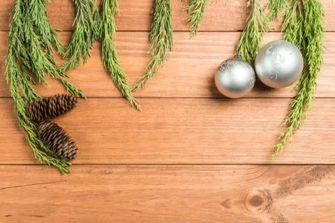 Christmas background made with pine branches, pine cones and Christmas decora Stock Photos