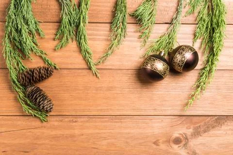 Christmas background made with pine branches, pine cones and Christmas decora Stock Photos