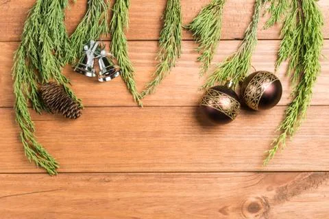 Christmas background made with pine branches, pine cones and Christmas decora Stock Photos