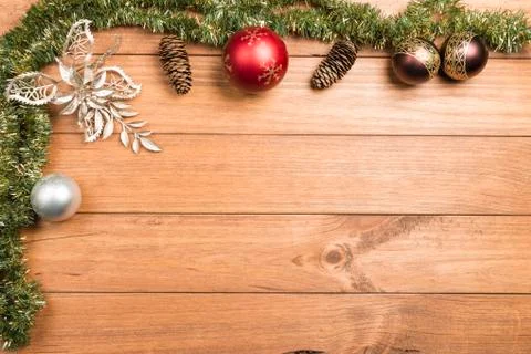 Christmas background made with pine branches, pine cones and Christmas decora Stock Photos