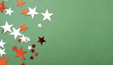 Christmas background with minimal composition, red and white stars on the top Stock Photos