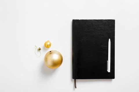 Christmas background with notebook, copy space. Template new year goal resolu Stock Photos