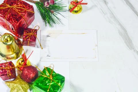 Christmas background with objects, stars, gift boxes with a red and white the Stock Photos