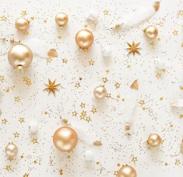 Christmas background pattern gold and white Xmas decorations on white backdrop.T Stock Photos