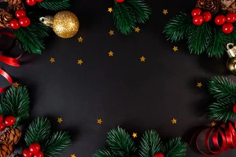 Christmas Background with Pine Branches and Gold Decorations Stock Photos