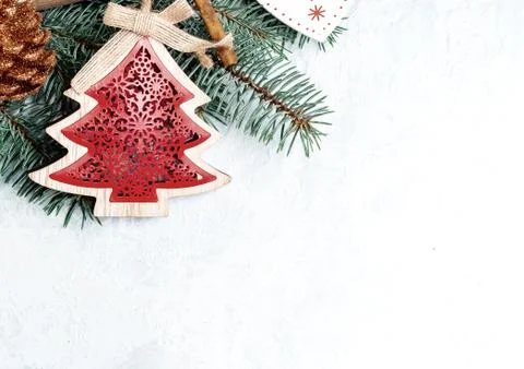 Christmas background red, border, branches of a Christmas tree, heart, pine c Stock Photos