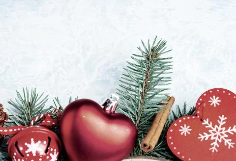 Christmas background red, border, branches of a Christmas tree, heart, pine c Stock Photos