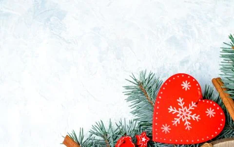 Christmas background red, border, branches of a Christmas tree, heart, pine c Stock-Fotos