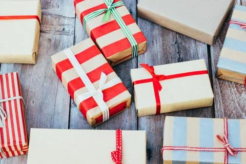 Christmas background with red gift boxes on the wooden board. 스톡 사진