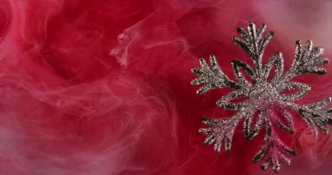 Christmas background snowflake ink red smoke flow Video stock 290288653