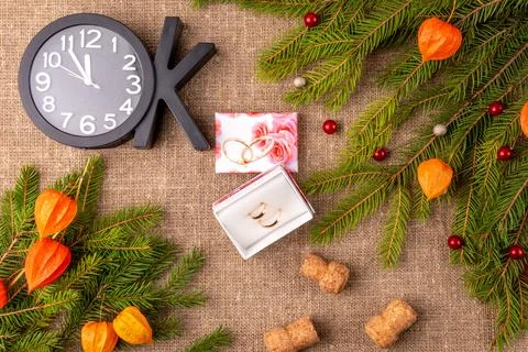 Christmas background with the texture of burlap, tree branches and toys Stock Photos