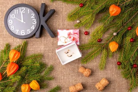 Christmas background with the texture of burlap, tree branches and toys Stock Photos