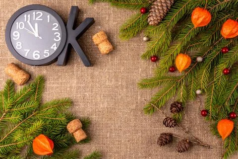 Christmas background with the texture of burlap, tree branches and toys Stock Photos