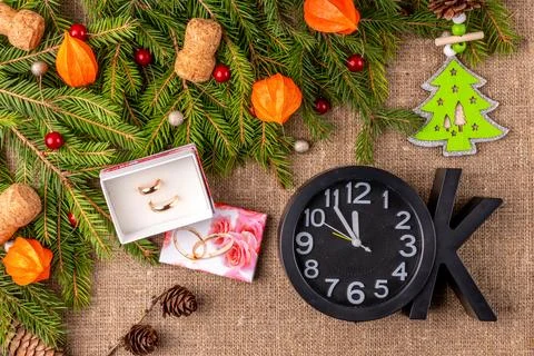 Christmas background with the texture of burlap, tree branches and toys Stock Photos