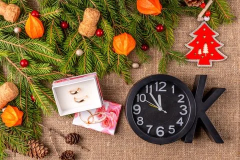 Christmas background with the texture of burlap, tree branches and toys Stock Photos