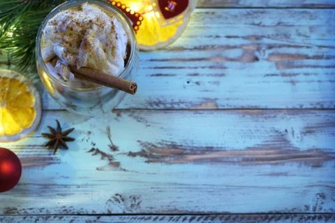 Christmas background top view with selective focus on cup of cream coffee Stock Photos