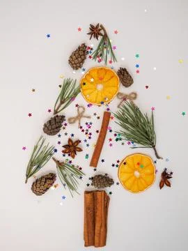 Christmas background on a white background, vertical layout. Christmas tree made Fotos Stock