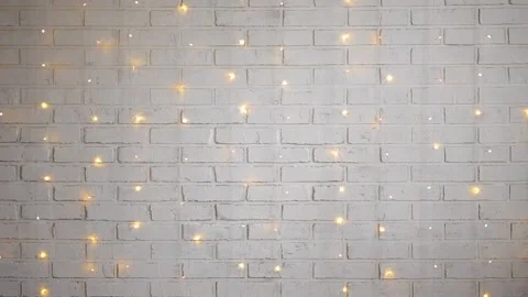 Christmas background - white brick wall with lights Stock Footage 185929295