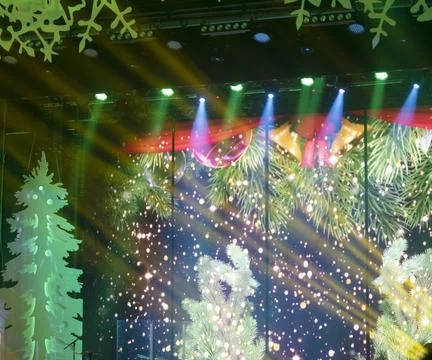 Christmas backgrounds with light rays. Spotlight realistic ray. Stock Photos