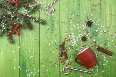 Christmas background,sweets and spices on a green table Stock Photos