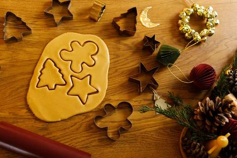 Christmas baking. Flat Lay Gingerbread Cookie Shapes with Metal Cutters. ho.. Stock Photos