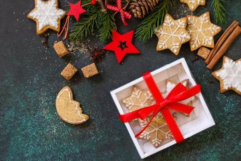 Christmas baking. Homemade Gingerbread cookies in a gift box on a stone or sl Stock Photos
