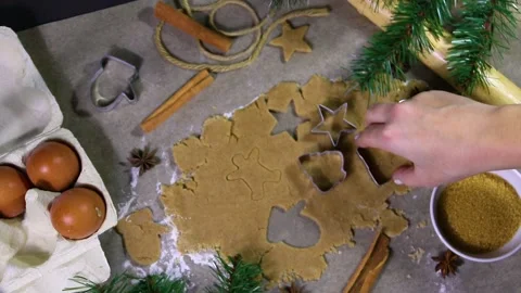 Christmas baking.Ginger dough for gingerbread,gingerbread men,stars Stock Footage 229151896