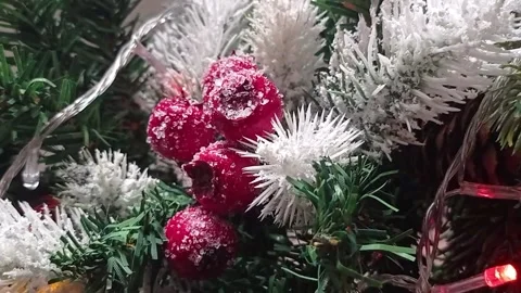 Christmas ball on the background of a festive tree, vertical video. Video stock 166141343