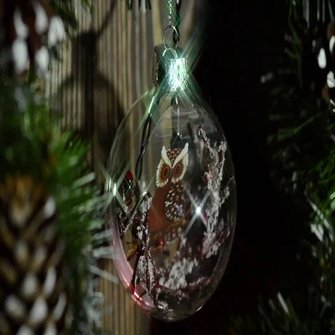 Christmas ball with blinking electric garland on the back Stock Footage