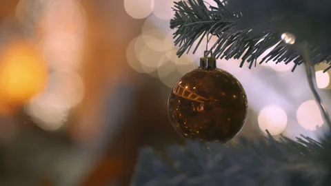 Christmas ball decorate on pine tree with blurred bokeh road light sparkling Stock Footage 166077914