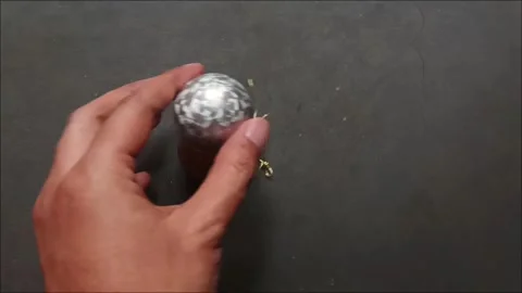 Christmas ball decorations made of silver mosaic and copper glitter Stock Footage 324769810