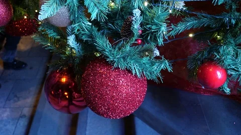 Christmas Balls on Christmas Tree, 1 January 2018 : People walk Stock Footage