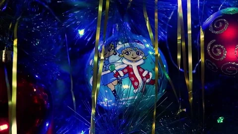 Christmas balls on the Christmas tree with a multi-colored garland Stock Footage 167761426
