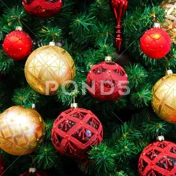 Christmas balls on Christmas tree Stock Photos