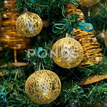 Christmas balls on Christmas tree Stock Photos