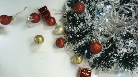 Christmas balls falling in slow motion on garlands Stock Footage 142078524