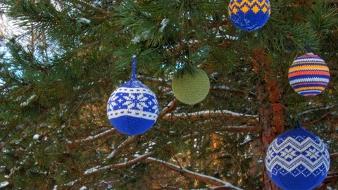 Christmas balls hanging on pine branches covered with snow Video stock 70293341