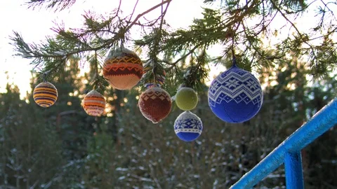 Christmas balls hanging on pine branches covered with snow Stock Footage 70298772