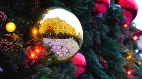 Christmas balls on the tree close up beside the Gum shopping center Stock Footage 99841608