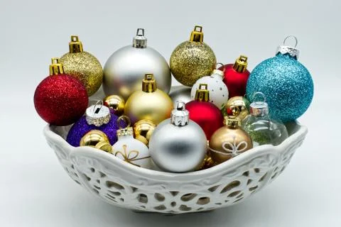 Christmas balls tree inside a ceramic bowl. Stock Photos