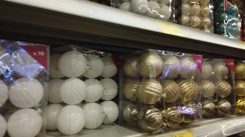 Christmas balls on the tree, shelf in the store Stock Footage 99888761