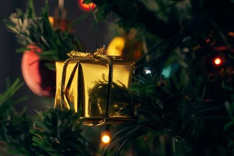 Christmas balls on the trees, the form of a gift Stock Photos