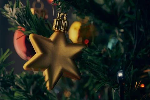 Christmas balls on the trees, star shape Stock Photos