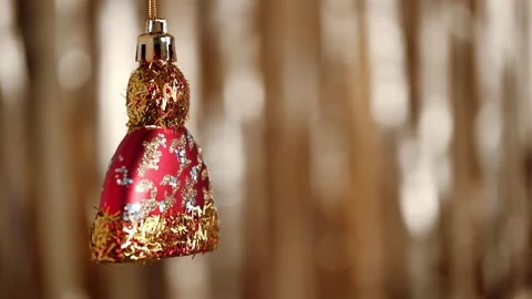 Christmas bauble in form red cap on background twinkling festive lights closeup. Stock Footage 259357838