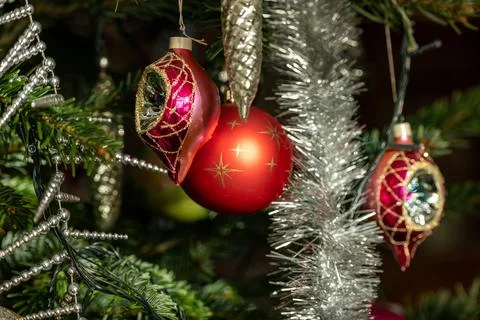 Christmas Bauble on Tree. Festive decorations on a Christmas tree. Stock Photos