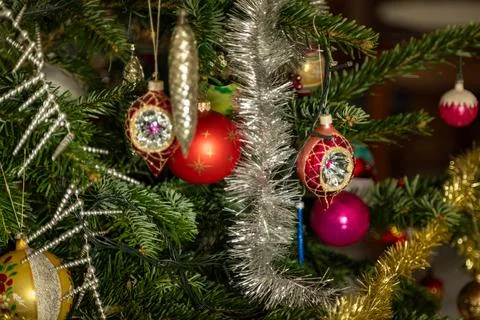 Christmas Bauble on Tree. Festive decorations on a Christmas tree. Stock Photos