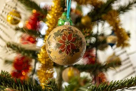 Christmas Bauble on Tree. Festive decorations on a Christmas tree. Stock Photos
