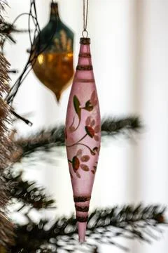 Christmas Bauble on Tree. Festive decorations on a Christmas tree. Stock Photos