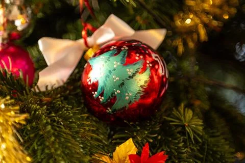 Christmas Bauble on Tree. Festive decorations on a Christmas tree. Stock Photos